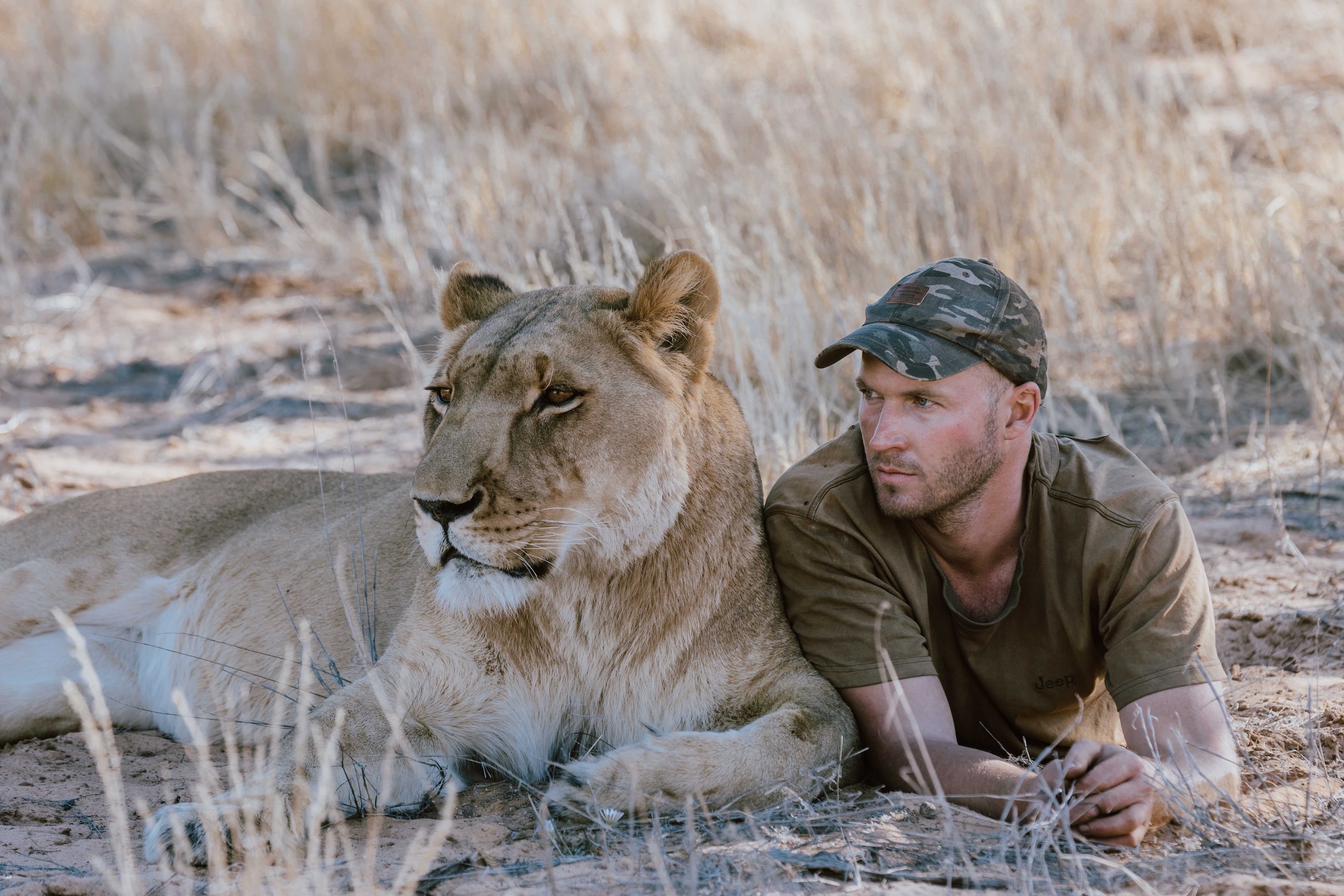 Valentin and adult Sirga lying side by side in the Kalahari